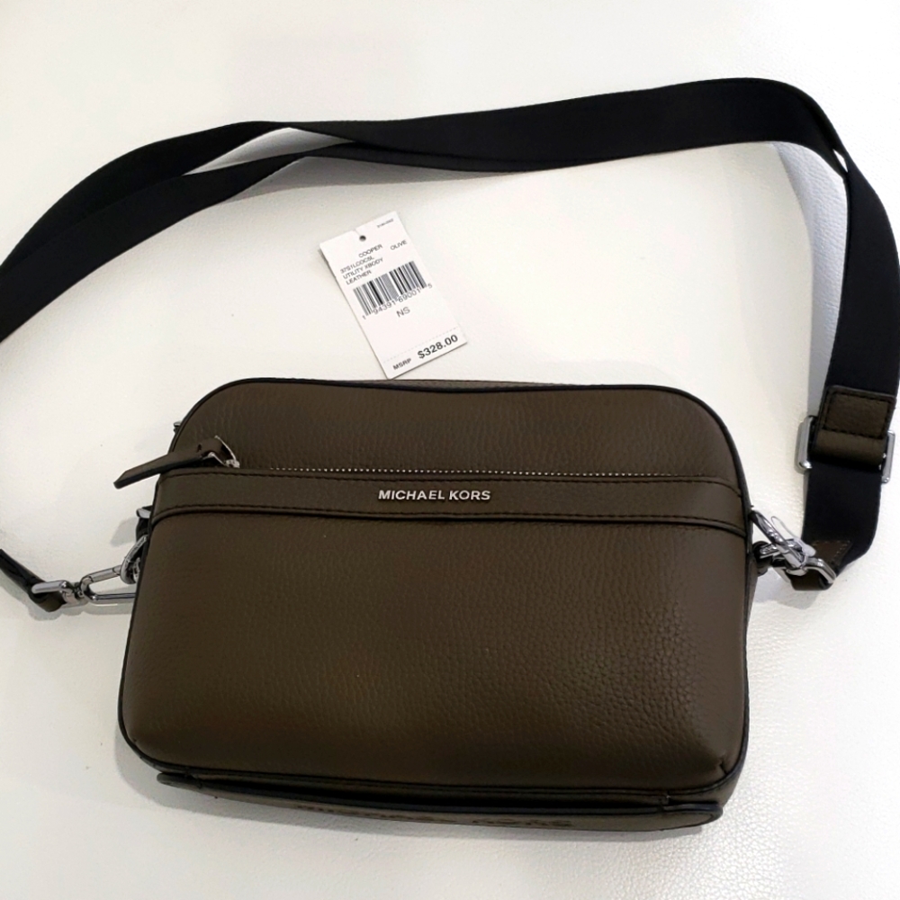 Mens Michael Kors authentic leather crossbody bag.